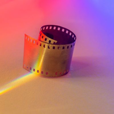 Gold,Film,Strips,On,Beige,Background.,Horizontal,Media,Theme,Poster,